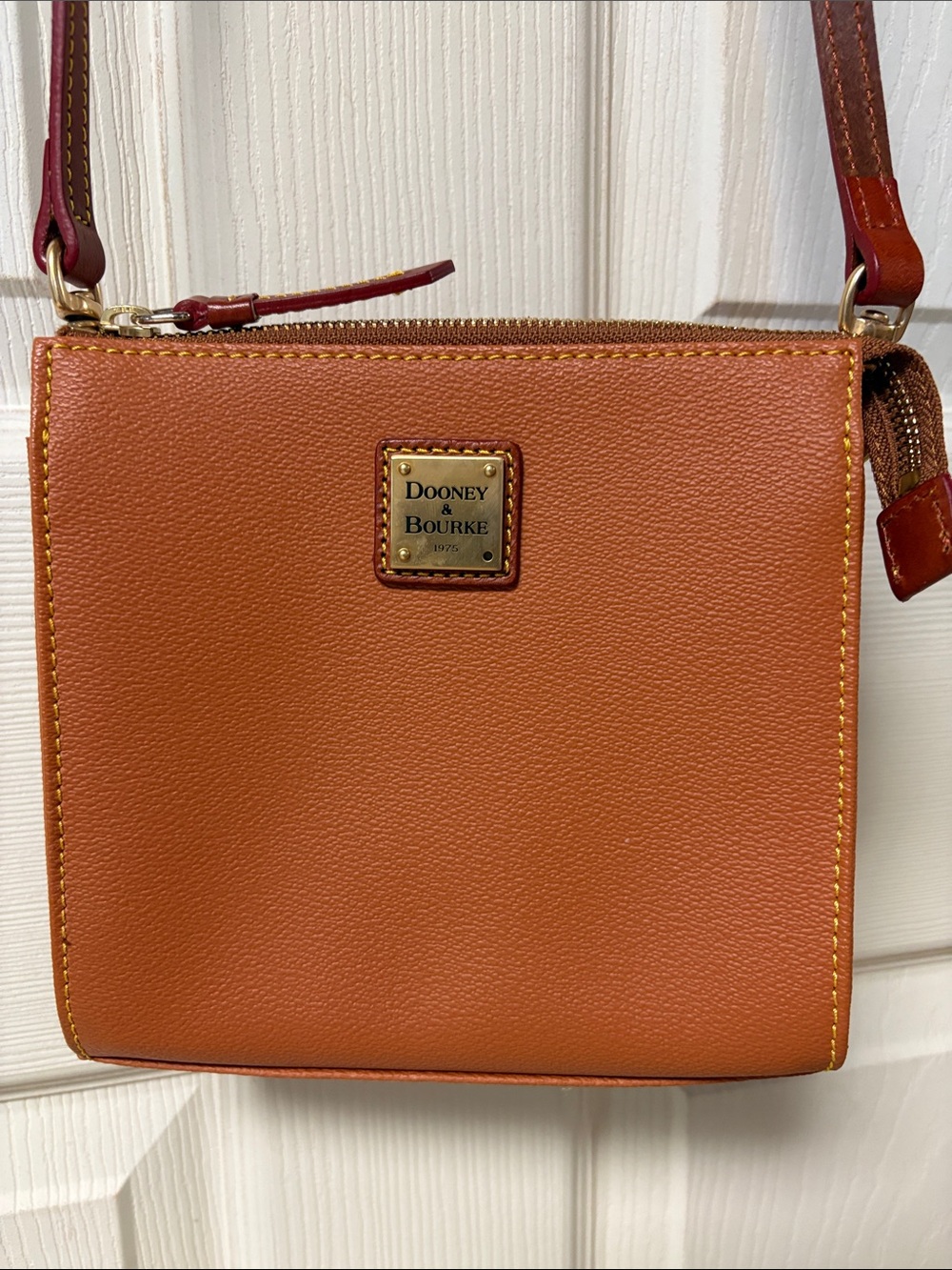 Dooney & Bourke Orange Pebble Leather Crossbody with Red-Brown Strap